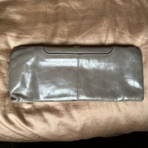 HOBO Grey Leather Clutch with Orange and Teal Patterned Lining